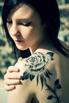 delicate rose tattoo