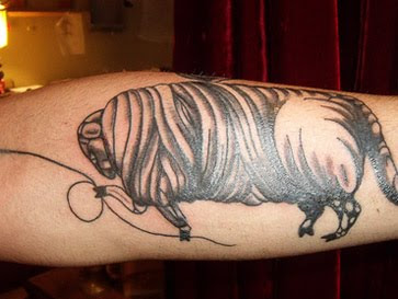 bull tattoo design on arm