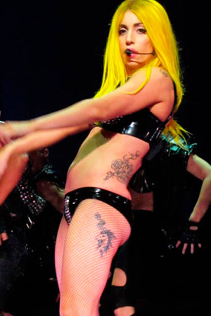 lady gaga back tattoo roses. Lady Gaga new unicorn tattoo