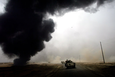 Burning US military tanks in Iraq