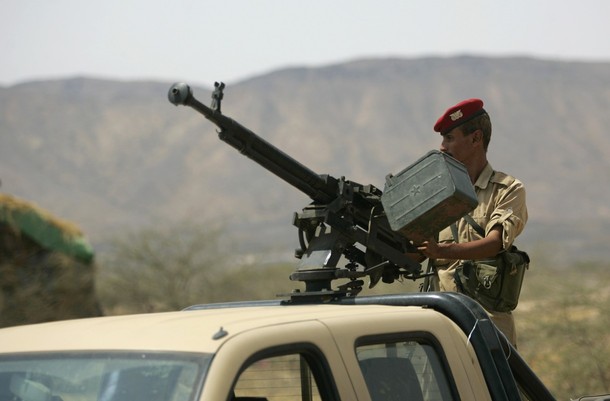      soldier+stands+guard+on+a+military+vehicle+at+checkpoint+on+a+road+near+the+Saudi+border+in+the+western+Yemeni+province+of+Hajja+October+10,+2009.jpg