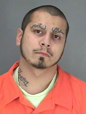 15 Most Stupid Forehead Tattoos - Oddee.com: "Does the cursive make this f* 