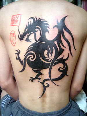 This is a very large tribal tattoo on