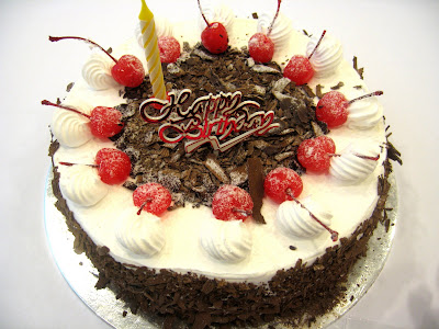  cake with succulent dark cherries and fresh cream. Happy Birthday Eric!