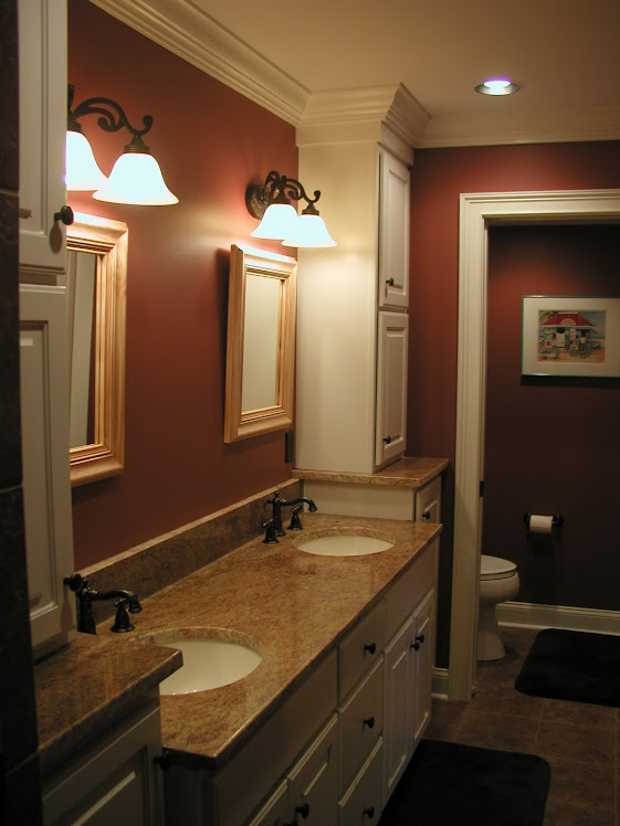 Custom vanity w/upper linen cabinets