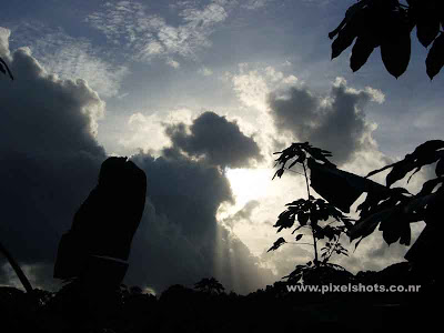 clouds over the sun photographed with digital camera panasonic lumix 