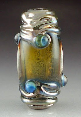 Triton focal bead