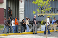 SOS co-workers of the emergency-relief-programme uploading donation-truck in Santo Domingo