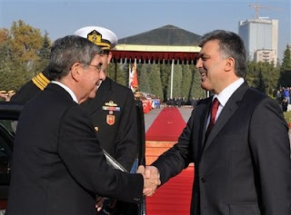 In this picture released by the Turkish Presidency Press Service, Turkish President Abdullah Gul, right, welcomes Costa Rica President Oscar Arias before during a ceremony at the presidential palace in Ankara, Turkey, Wednesday, Nov. 25, 2009. ( AP PhotoMustafa Oztartan, Turkish Presidency Press Office)