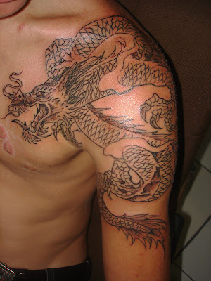dragon tattoo art. Label: Arm tattoo, Dragon,
