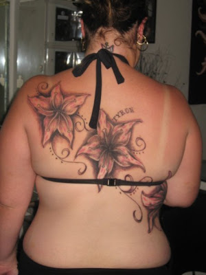 flower tattoos on side of hand. Female Back Flower Tattoos