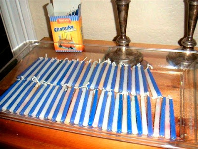 array of chanukah candles in blue and white, waiting to become havdallah candles