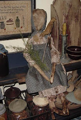 Primitive Prairie doll w/folkart bird