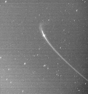 Cassini images reveal the existence of a faint arc of material orbiting with Saturn's small moon Anthe.