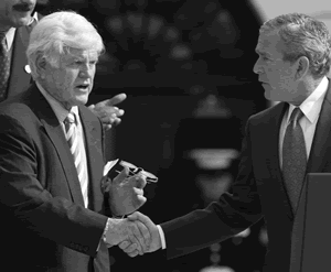 [Bush+Kennedy+handshake+AP.gif]
