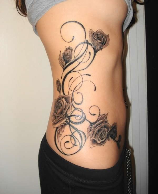 Japanese Flower Tattoo Design on Side Girl Rose Tattoos The beauty of a rose 