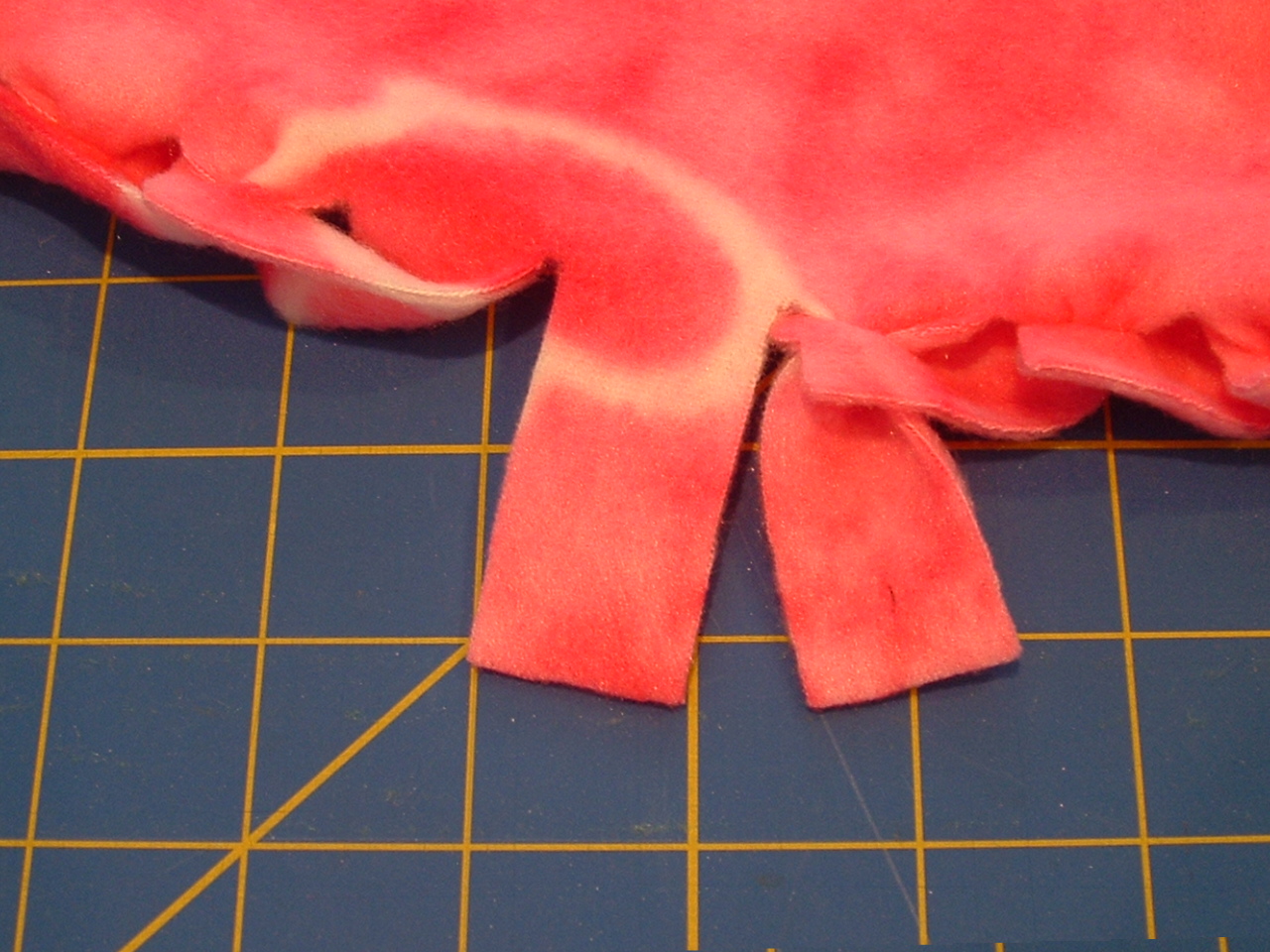 Pieces by Polly Single Layer NoSew "Braided" Fleece Blankets Tutorial