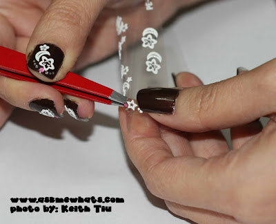 It is easier to use a tweezer to grab the nail art sticker
