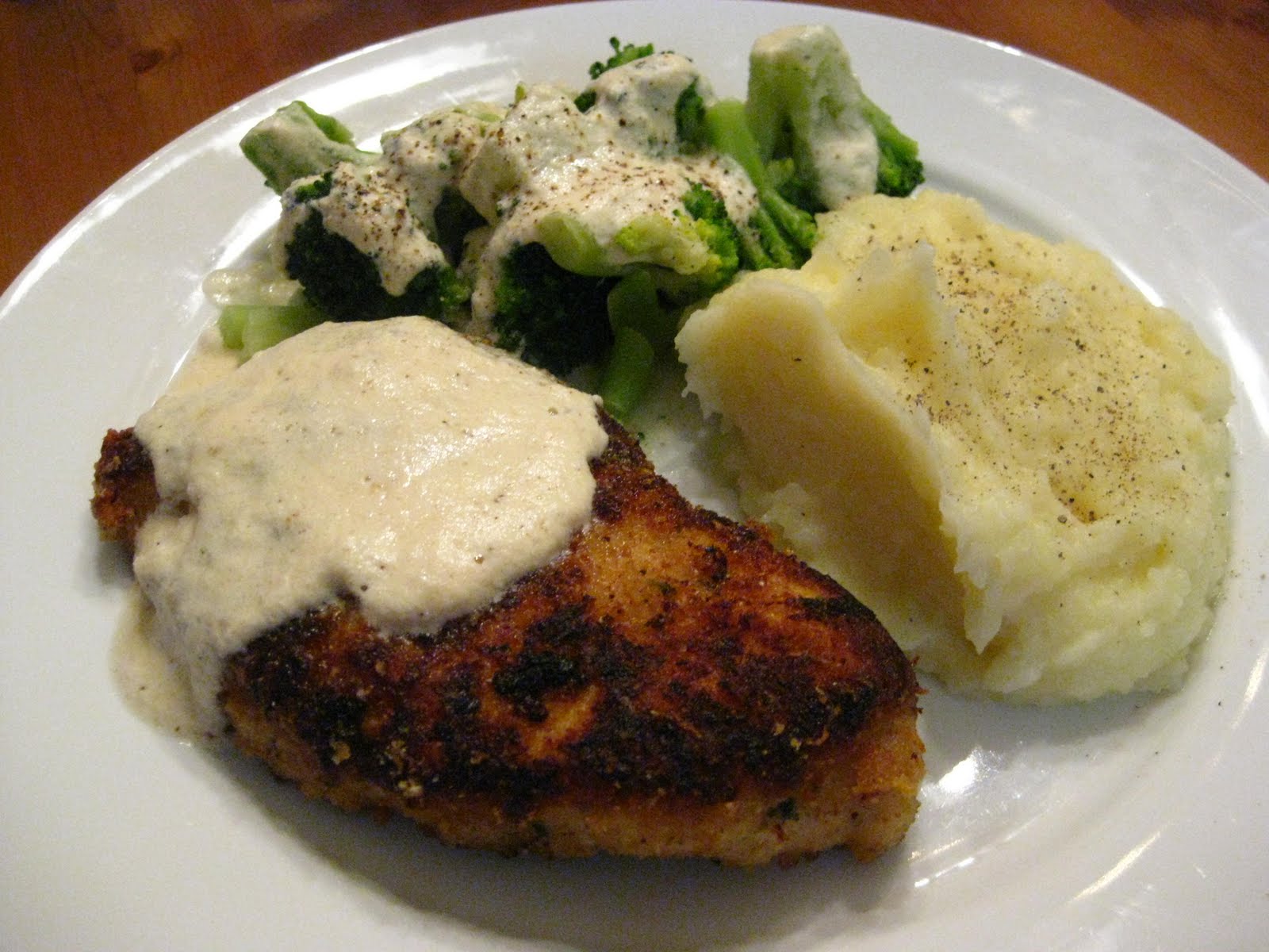 A Taste of Home Cooking Breaded Chicken, Mashed Potatoes and Broccoli