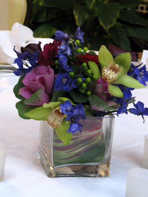 For the fountain arrangements I used flowering kale dark blue delphinium 