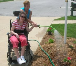 Ashley & Mom Watering the Flowers