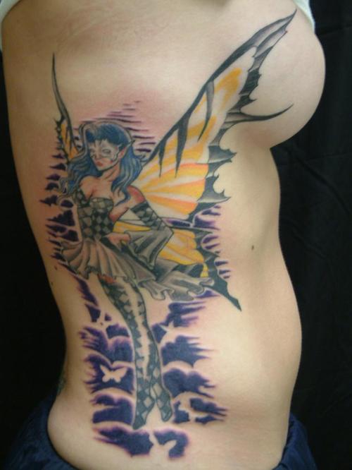 She also has a pattern of tattoos on her back, symbolizing her warrior