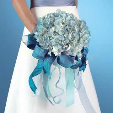 Hydrangea bouquets are lovely full and romantic with their soft pastel blue
