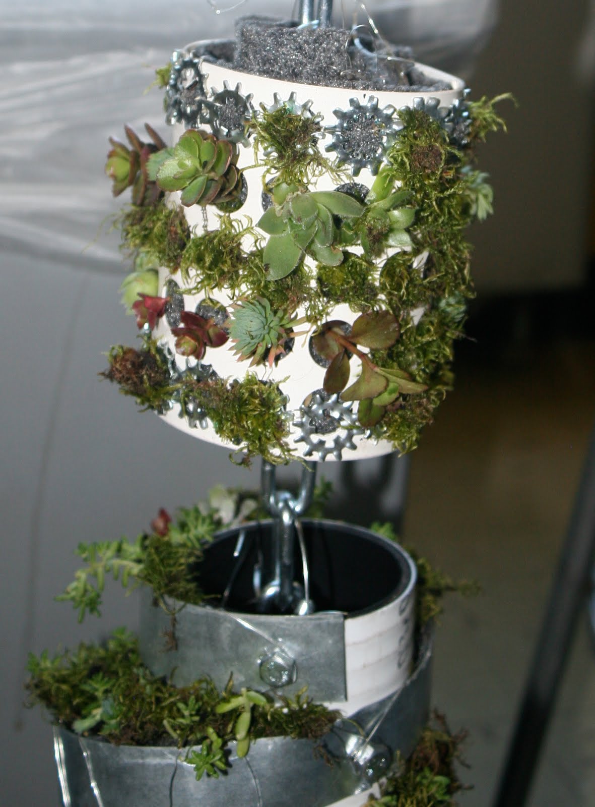 Horticultural Building Systems "Rain Chain Planters" Rena Schlachter