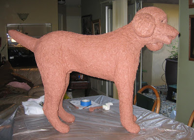 clay poodle styrofoam is coated with modeling clay