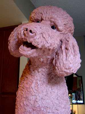 3-4 layers of clay, Final detail is applied to clay poodle 