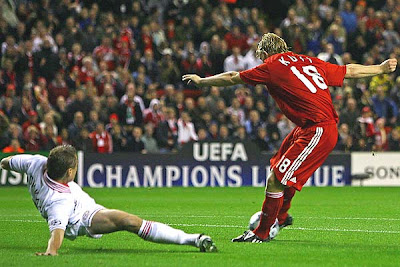Dirk Kuyt of Liverpool scores the opening goal in the 4th minute during the UEFA Champions League Group D match between Liverpool and PSV Eindhoven at Anfield on October 1, 2008 in Liverpool, England.