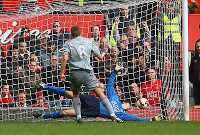 Steven Gerrard of Liverpool scores his team's second goal from the penalty spot.