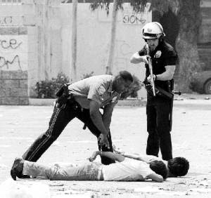 Man Beating Man
