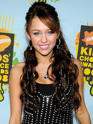 miley cyrus hairstyles curly. Miley Cyrus long curly