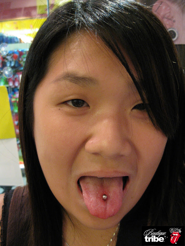 Tongue piercing title=