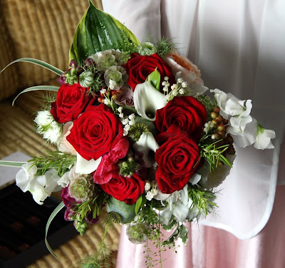 Fabulous Red Roses in a luscious wedding bouquet Window sill decoration