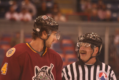 Credit: Jane Rickard, a rare photo of Boris Valibik and a linesman exchanging smiles