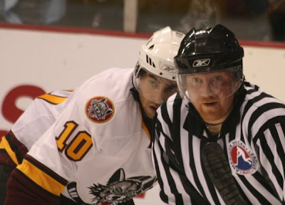 Credit:Jane Rickard, to date my favorite Krog shot. It was take at the opening face off of overtime first game against the new AHL Hogs. Both teams had pushed each other to the limit. Just look at the exhaustion on their faces.I can't remember who won but I do remember what a great game it was.