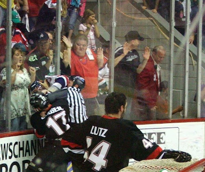 Credit:Colonial Cup Championship 2007 Game 6, one of the best photos of the night, capturing the spirit of the game and place!