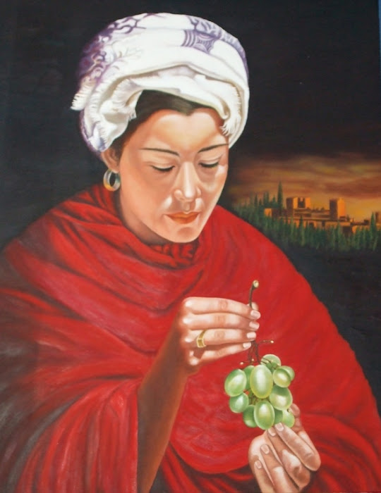 Mujer con uvas en Granada