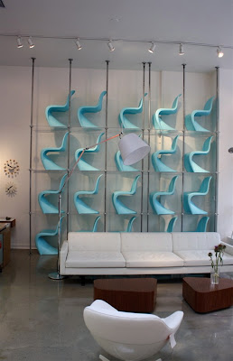 A wall of Verner Panton chairs in Hive Modern, Portland, OR, impresses style and trends writer and public relations consultant Christine Sisson