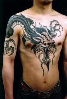 tribal dragon head tattoos