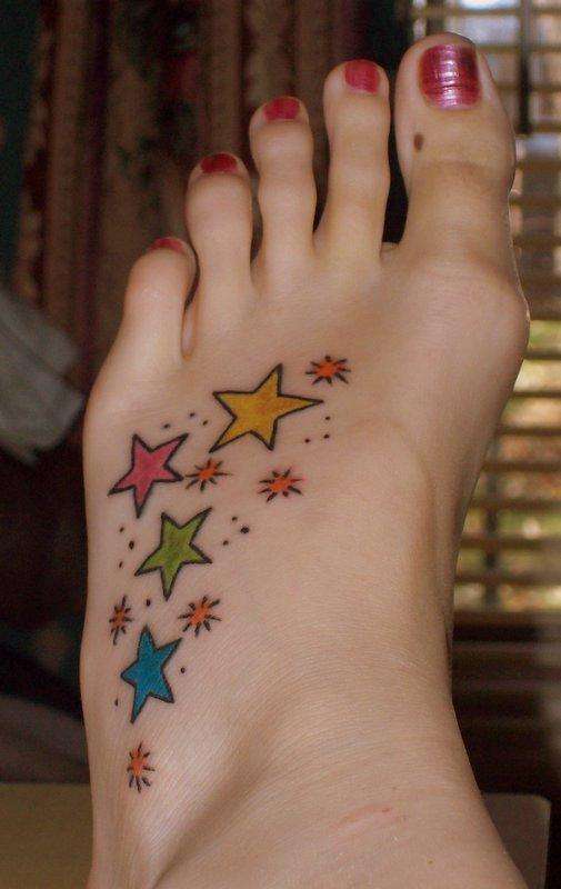 small star tattoo on foot