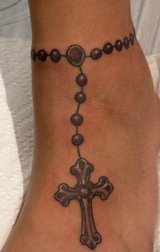 Rosaries For Women. Tattoo behind women without