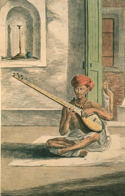 Indiano tocando SITAR