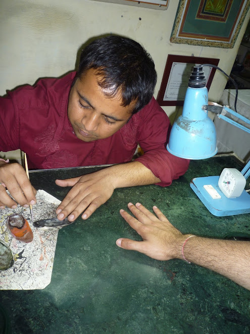 Cameron having his nail painted by the world-class master of miniature