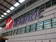 One last group shot at the London Heathrow Airport before we go through the . (img )