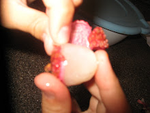 Peeling a lychee