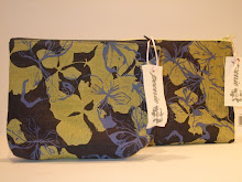 Handprinted washbags with contrast zips and patterned linings