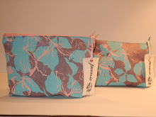 Handprinted washbags with contrast zips and patterned linings